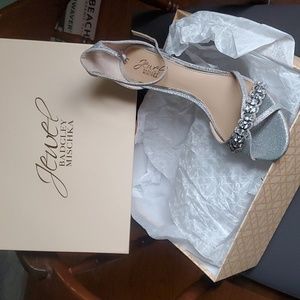 Silver shoes by Jewel Badgley Mischka